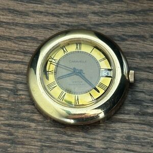 Vintage Mechanical Caravelle by Bulova Gold Tone Watch - Roman Numerals